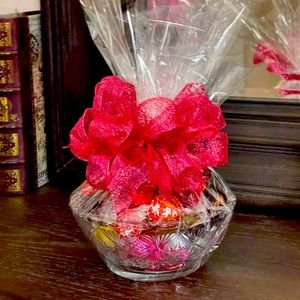 Beautiful glass candy bowls with Lindor, Dove, & Godiva chocolates.Decorated